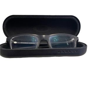 Oakley men’s prescription frames in grey metal. Very good condition.